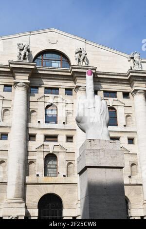 Milan, Italy. 10th Mar, 2021. Milan, Italy The Finger LOVE sculpture by the artist Maurizio Cattelan in Piazza Affari in front of the Milan Stock Exchange with the nail painted pink in the claim of the artist Ivan Tresoldi named Love Assai. In the photo: the pink painted nail of the sculpture the LOVE finger Credit: Independent Photo Agency/Alamy Live News Stock Photo