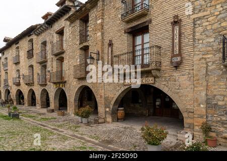 Ainsa, Spain - 6 March, 2021: A view of the Plaza Mayor town square in Ainsa in the Spanish Pyrenees Stock Photo