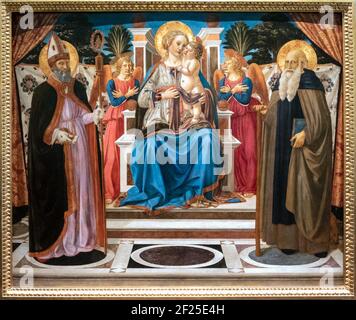 FLORENCE, TUSCANY/ITALY - OCTOBER 19 : Madonna and child enthroned with angels St Nicholas and St Anthony the Abbot painting in Stock Photo