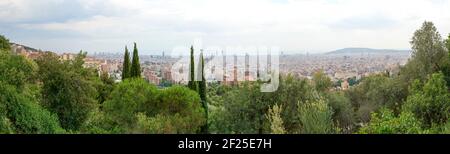 Panoramic view towards coast from edge side of Park Güell on Carmel Hill in Barcelona, Catalonia, Spain. Stock Photo