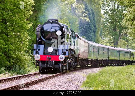 Rebuilt Bulleid Light Pacific No. 34059 Steam Locomotive near Kingscote Station Stock Photo