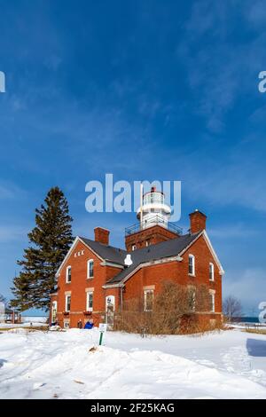 Big Bay Point Lighthouse along Lake Superior northwest of Marquette in February, Michigan, USA [No property release; available for editorial licensing Stock Photo