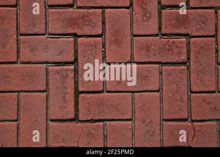 Red Cracked Ground Tiles Background Stock Photo