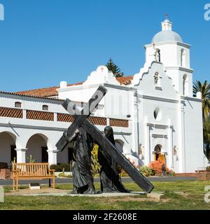 Oceanside, California  USA - March 5, 2021: Statues of Jesus and Mary in front of Mission San Luis Rey, square format, close up Stock Photo