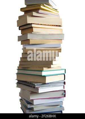 A tall stack of many books piled high, isolated on white Stock Photo