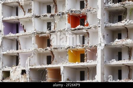 Destroyed apartment building without a front wall. Stock Photo