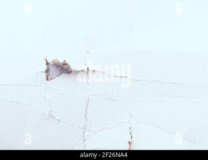 A texture of a white crumpled and torn paper background Stock Photo