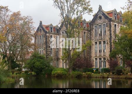 Abandoned buildings old thermal hospital with a lake and D. Carlos I park in Caldas da Rainha Stock Photo