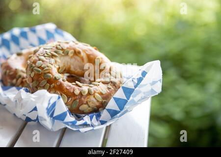 Bavarian bread for breakfast, blue white paper Stock Photo