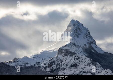 snowy rocks in high mountain environment Stock Photo