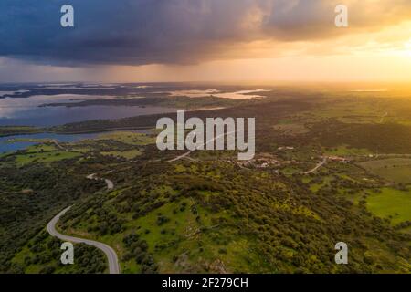 Alentejo drone aerial view of the landscape at sunset with alqueva dam reservoir, in Portugal Stock Photo