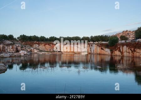 Marble mines red rocks in Estremoz Borba and Vila Vicosa, Alentejo, Portugal Stock Photo