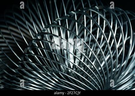 Abstract metal spirals with black background. Stock Photo