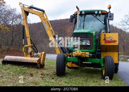 Tractor with discount side arm mower