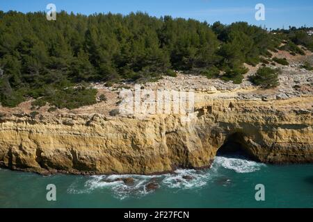 Wild beach nature landscape with turquoise water in Benagil Algarve, Portugal Stock Photo