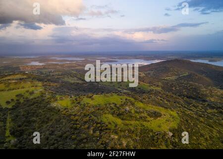 Alentejo drone aerial view of the landscape at sunset with alqueva dam reservoir, in Portugal Stock Photo