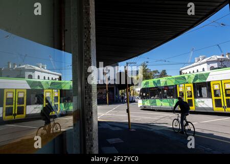 A tram passes the corner of Gertrude street and Smith Street in Fitzroy, Melbourne, Victoria, Australia Stock Photo