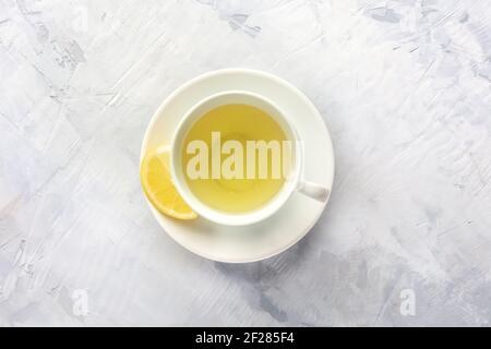 A photo of a cup of tea with lemon, shot from the top Stock Photo