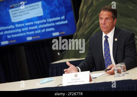 NEW YORK, NY - JULY 6: New York State Governor Andrew Cuomo updates New Yorkers and announces mid-Hudson region to enter phase IV of reopening tomorrow and calls on President Trump to acknowledge that COVID-19 exists and is a problem. Cuomo also confirms 518 additional coronavirus cases in New York State at the Governor's Office in New York City on July 6, 2020. Credit: mpi43/MediaPunch Stock Photo