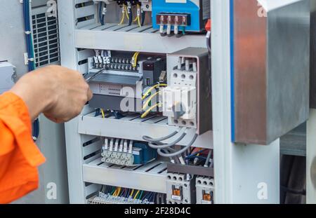 Engineers are checking the operation of the control panel, solar panel adjustment system according to the sun, Professional engineer concept about sol Stock Photo