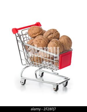 Walnuts in shopping cart Stock Photo