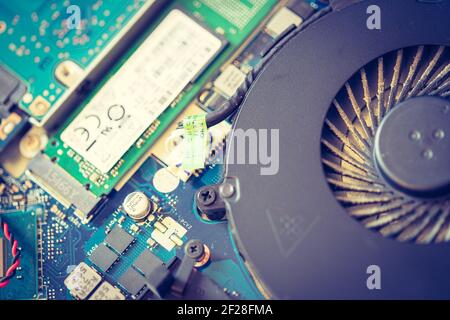 Computer Technology, overclocking: Close up of a cooling fan on a circuit board Stock Photo