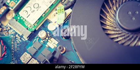 Computer Technology, overclocking: Close up of a cooling fan on a circuit board Stock Photo