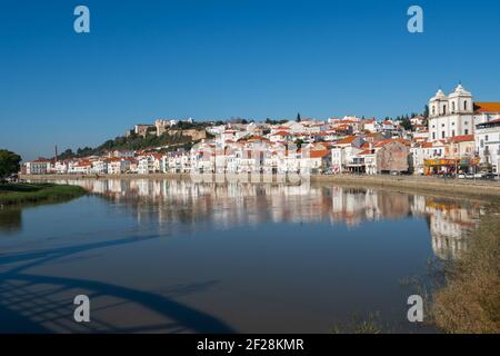 View of Alcacer do Sal cityscape from the other side of the Sado river Stock Photo