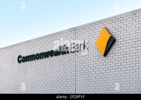 Adelaide, South Australia - August 17, 2019: Commonwealth Bank branch logo sign above the entrance near Unley shopping center Stock Photo