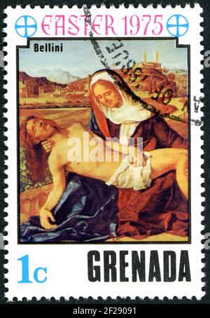 GRENADA - CIRCA 1975: A stamp printed in Grenada, shown the painting by Giovanni Bellini - Pieta, circa 1975 Stock Photo