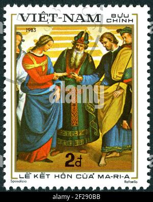 VIETNAM - CIRCA 1983: A stamp printed in Vietnam, shown the painting by Raphael - “The Marriage of Mary”, circa 1983 Stock Photo
