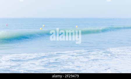 Waves breaking on shore. Stock Photo