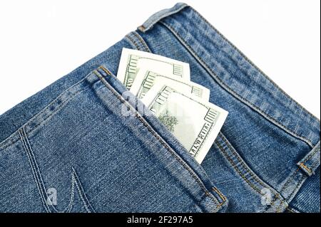 Dollar bills in the back pocket of jeans. High quality photo Stock Photo