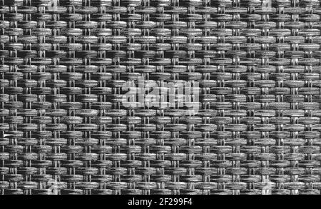 Distressed overlay wicker vine texture. grunge black and white background. abstract halftone vector illustration Stock Vector