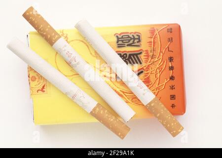 Cigarettes made of the dried leaves of Panax ginseng, medicinal plant, ginseng plant, traditional medicine in asia, corea, Ginseng, panax ginseng  / Stock Photo