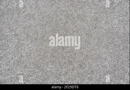 Gray granite background from small stones. Stock Photo
