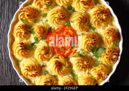 Fish pie, fisherman pie, made with white fish poached in a white sauce and topped with mashed potatoes, british cuisine Stock Photo