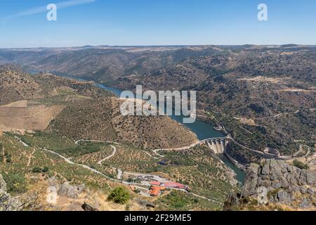 Aerial view from Penedo Durao viewpoint, typical landscape of the International Douro Park, dam on Douro river and highlands in the north of Portugal, Stock Photo