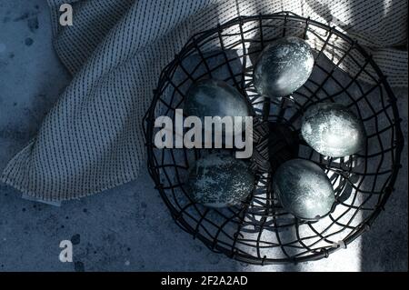 Happy Easter. Stylish easter blue eggs. Series of eggs with marble stone effect painted Stock Photo