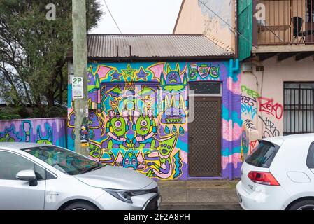 A street mural by Daisy Knight in 2019 titled Greetings from the Monster Friends in Bedford St West, Newtown, Sydney, Australia Stock Photo