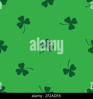 Clover leaves shamrock seamless pattern on green background. Stock Vector