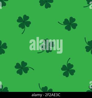Clover leaves seamless pattern on green background. Stock Vector