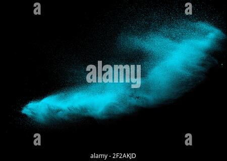 Green sand explosion isolated on black background. Stock Photo