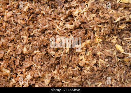 Background made of fresh chopped mushrooms with onion, close up shot, top view. Stock Photo