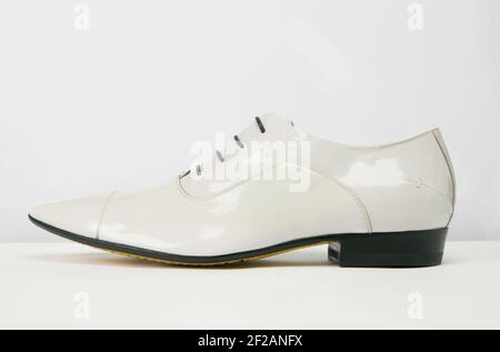 Elegant footwear personal accessory for men. Steel life studio shoot. Stock Photo