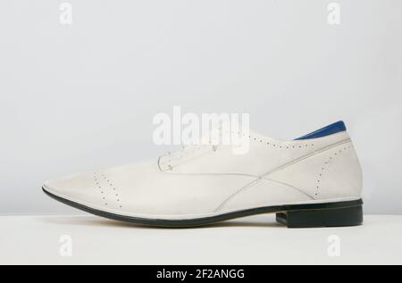 Elegant footwear personal accessory for men. Steel life studio shoot. Stock Photo