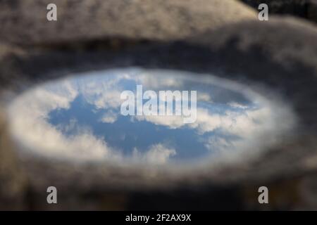 Giant Causeway - Fallen Sky, reflection in water, reflection of the sky in water, puddle, rocks, giant causeway, northern Ireland; cloudscape Stock Photo