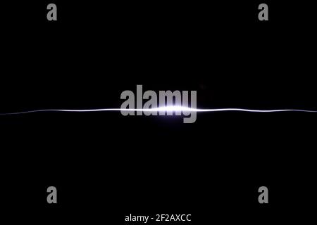 Light painting, line painted by light, line of light, line of light, light trail, light painting, black background, painted with light, creative way Stock Photo