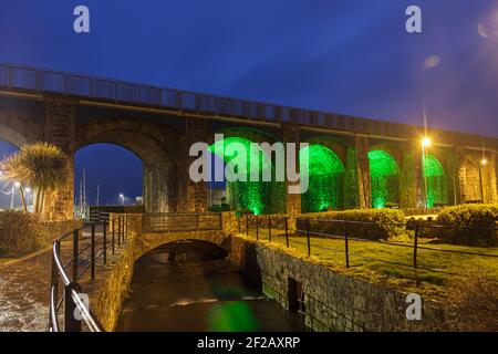 Railway Bridge, Arch bridge illuminated in green, Global greening for St. Patrick's Day, 17th of March, Paddys Day celebration Stock Photo