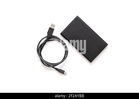 A Hard disk (HD) or Solid state disk (SSD),with an USB cable isolated on white background Stock Photo